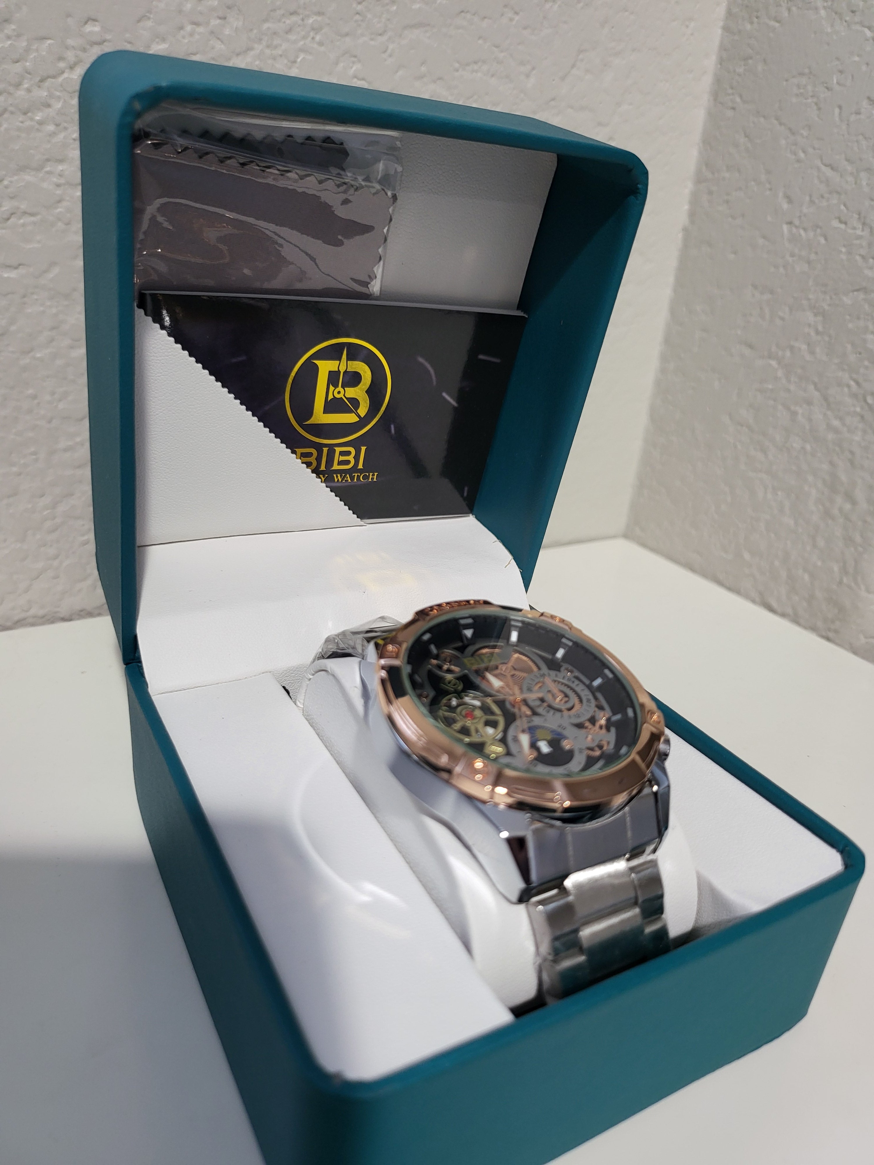 BIBI Luxury Skeleton Watch – Rose Gold & Black Stainless Steel Timepiece