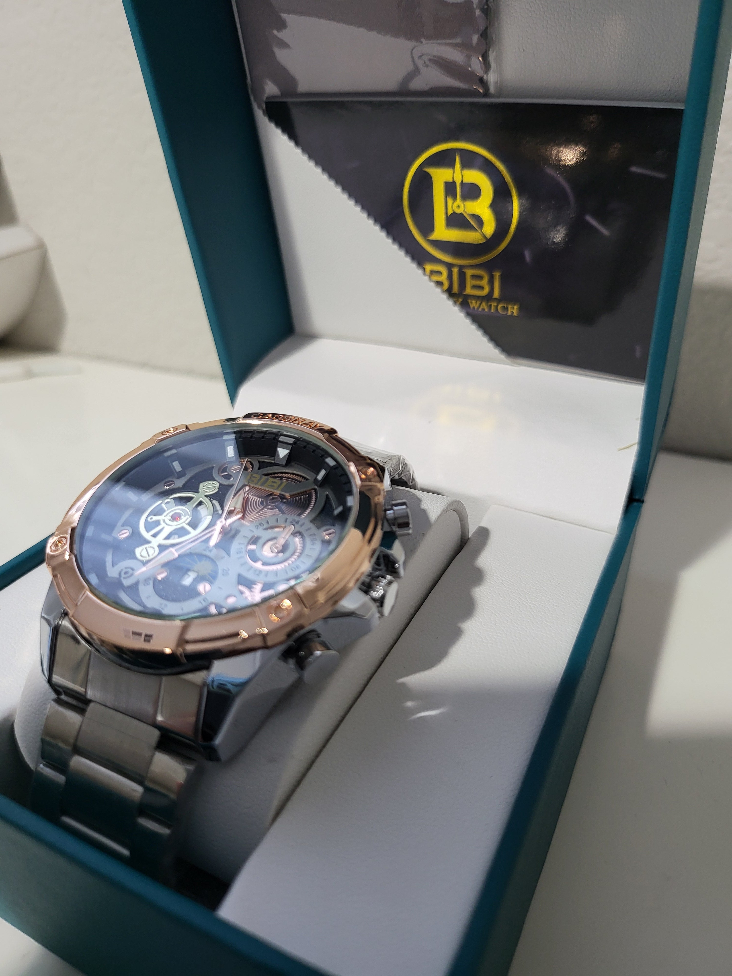 BIBI Luxury Skeleton Watch – Rose Gold & Black Stainless Steel Timepiece